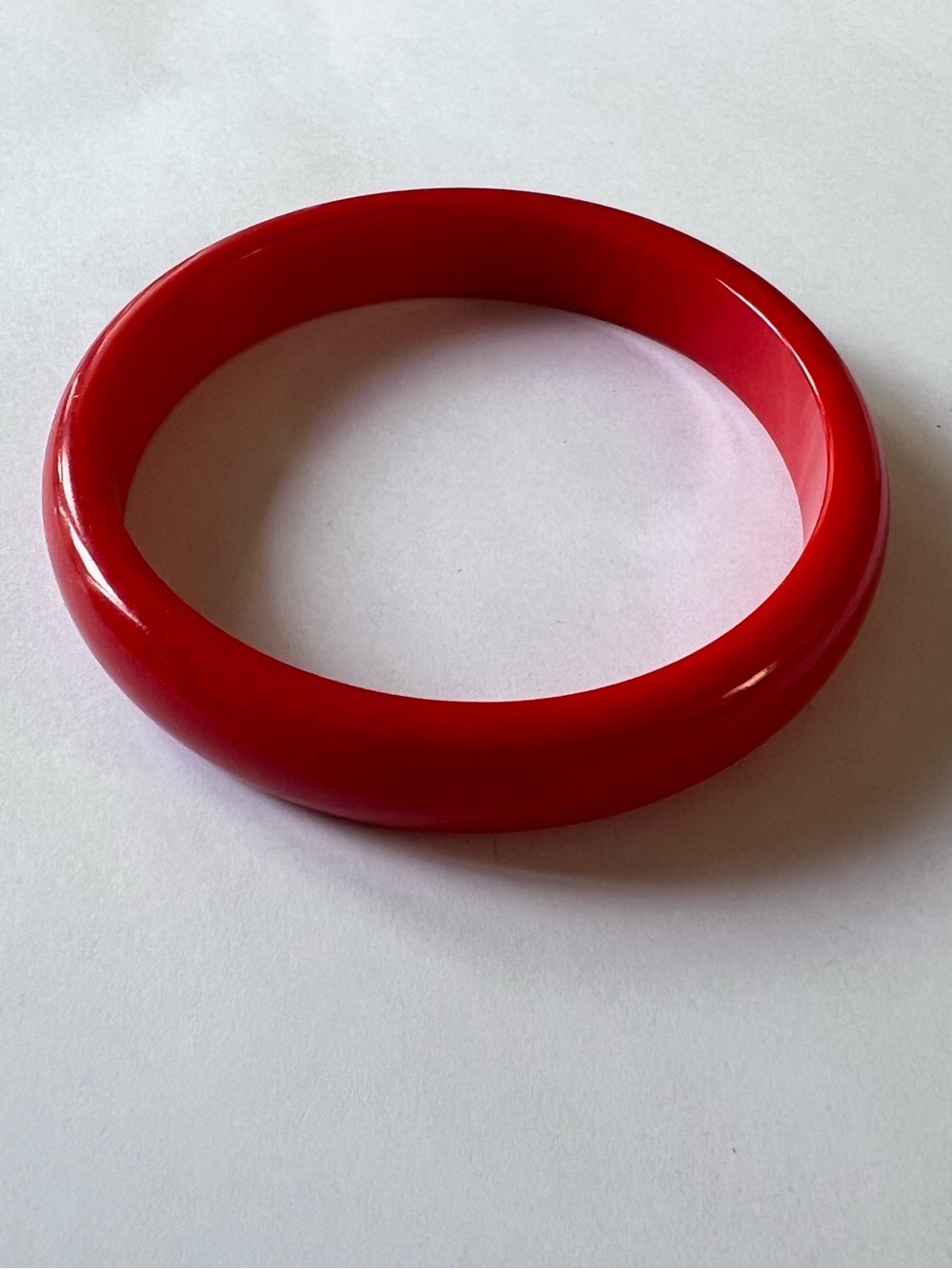 Vintage, red BAKELITE bracelet. 20 grams. Faint orange/yellow marbling.